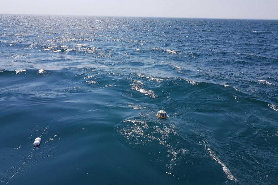 A wave buoy in the water.