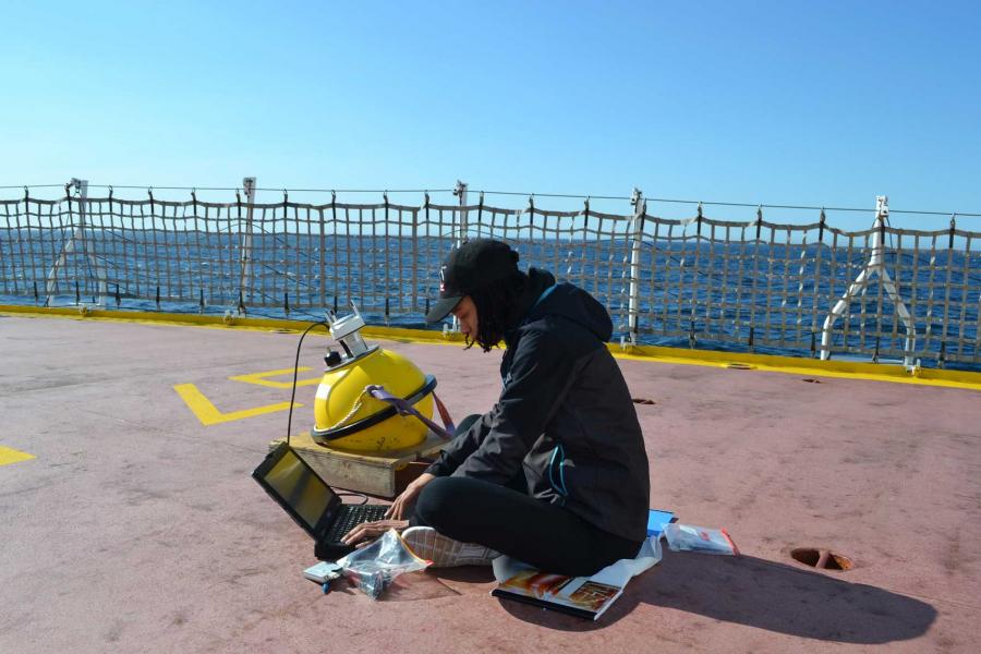 Yanique Campbell testing a wave buoy.