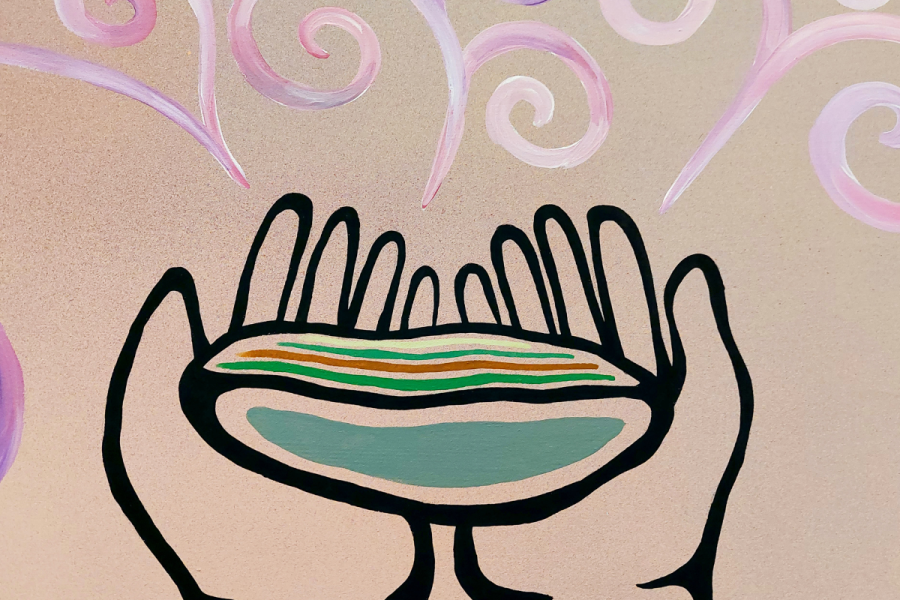painted hands holding a shell