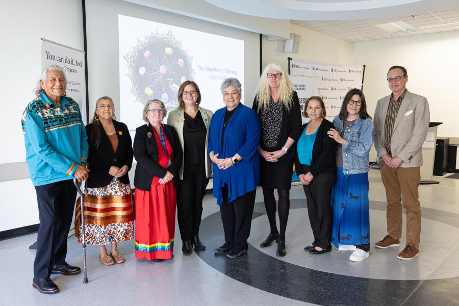 blue heron name reveal organizers group photo