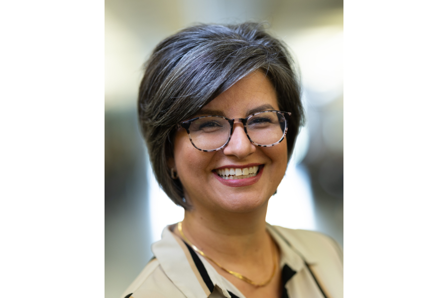 head shot woman with glasses and shorter hair