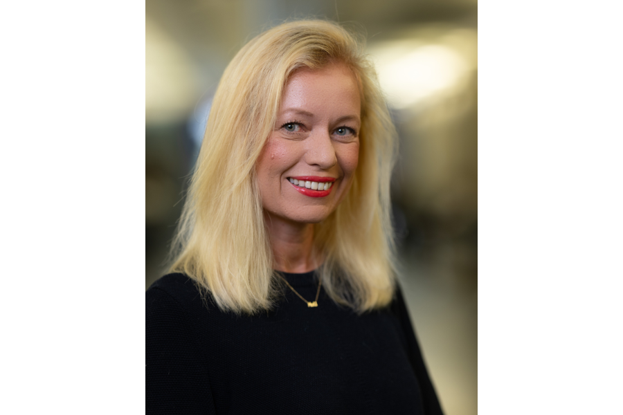 head shot woman with blonde shoulder length hair