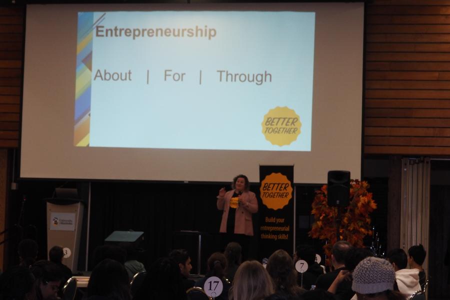 Janine Carmichael speaking on stage at Better Together 2023