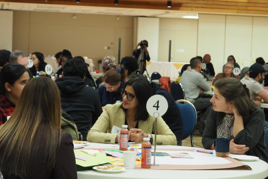 Student listening to a team members idea at Better Together 2023