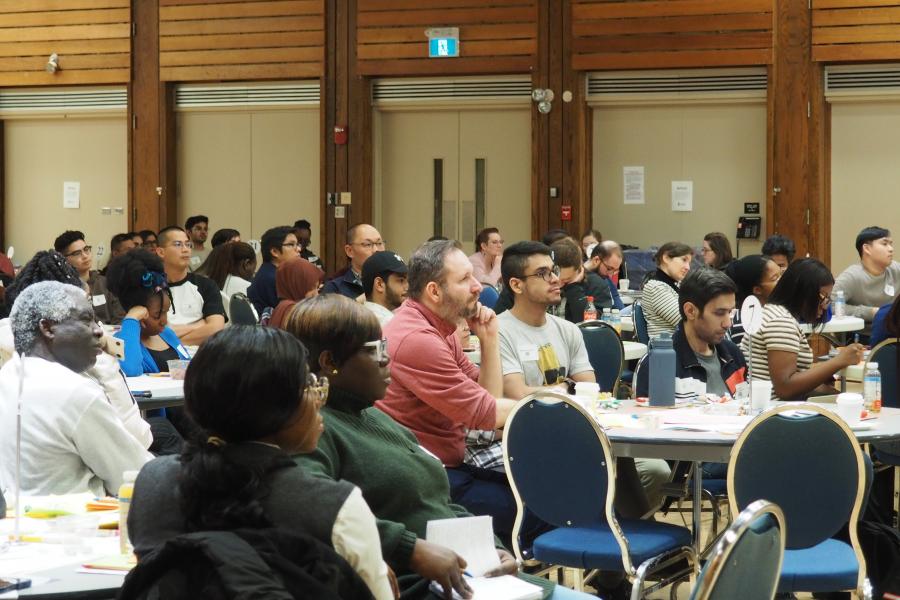 Large group of people listening to a presenter at Better Together 2023