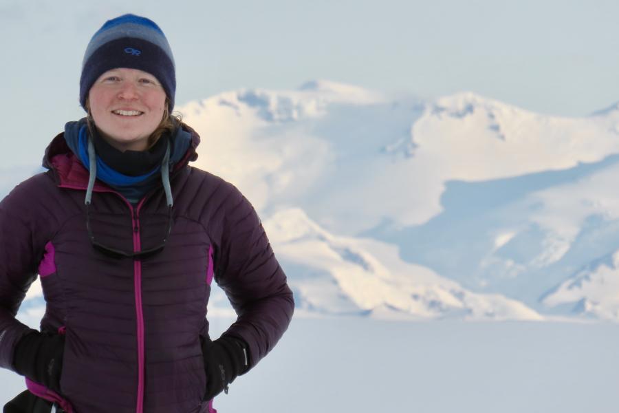 Doctor karen alley posing in parka and toque hands in pockets.