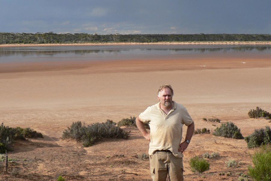 Ian ferguson standing in front of a savannah.