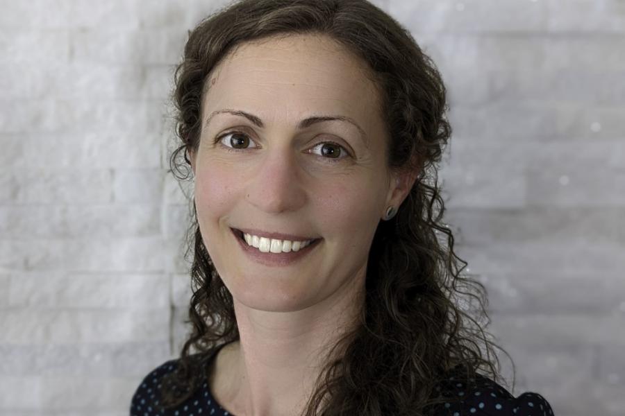 Dr. kristina brown smiling at camera.