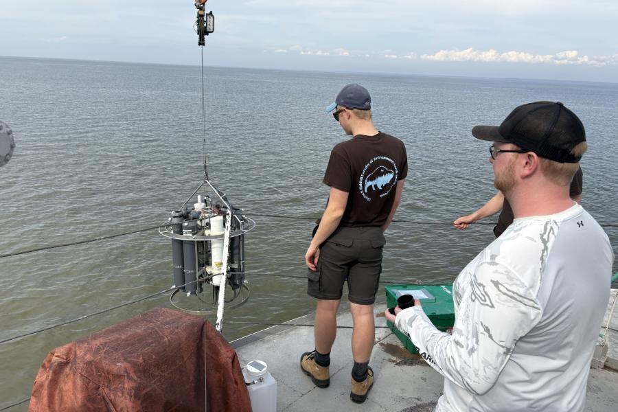 Students taking water samples in lake winnipeg