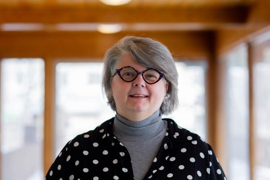 a headshot photo of doctor catharine hallman