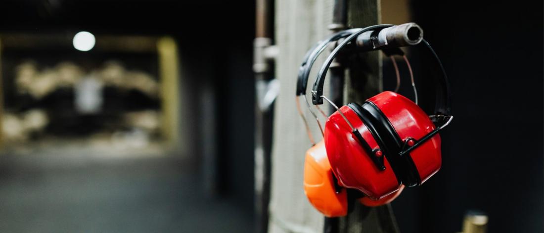 Hearing protection hanging on a hook.