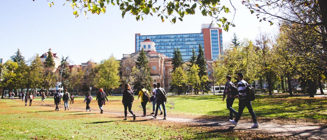 An image of student walking on UM's Fort Garry Campuses during summer.