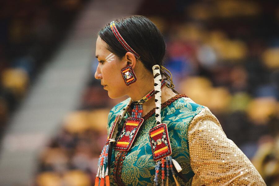 A photo of an Indigenous person during Graduation Pow Wow.