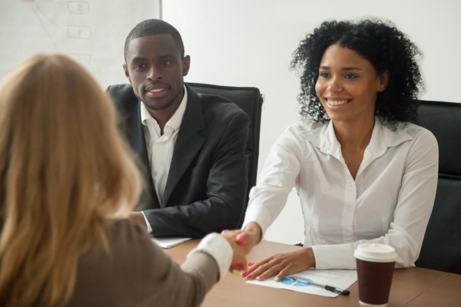 handshake between two HR professionals