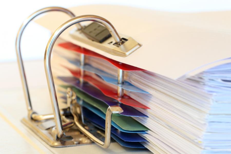 Paper documents in a binder