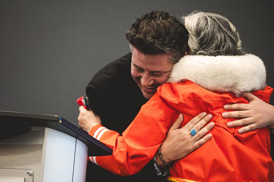 Sky Bridges of The Winnipeg Foundation hugs residential school Survivor Levinia Brown.
