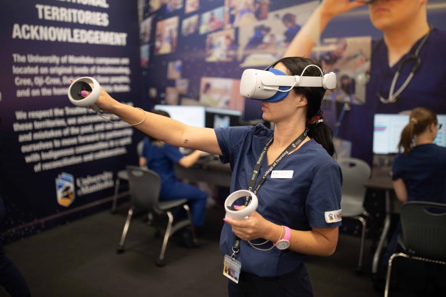 A student using virtual reality equipment.