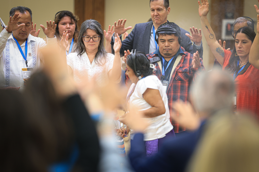 Participants take part in a blessing ceremony.