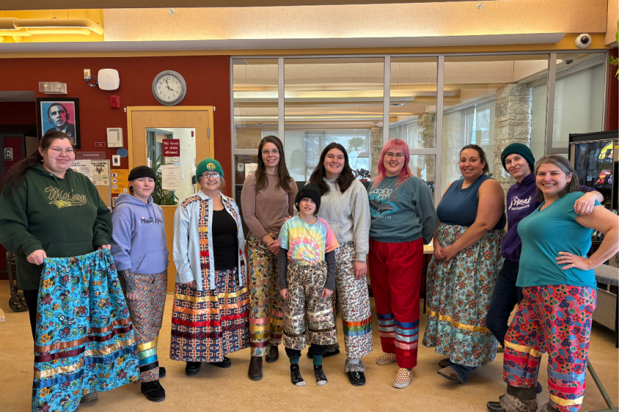 Participants posing together during a cultural program activity.