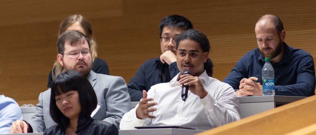 Law students asking questions during their first day at Law School