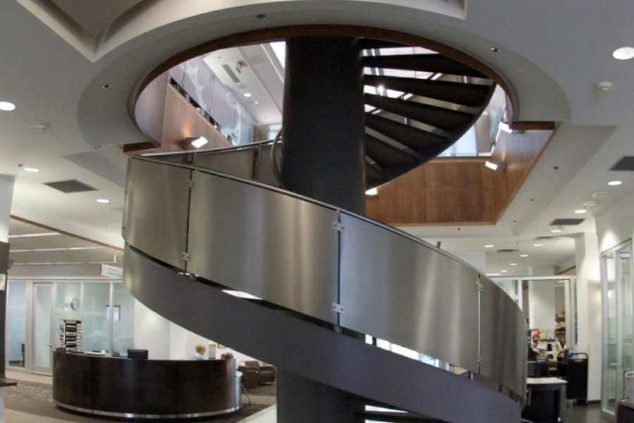 Spiral staircase to next floor at center of UM health sciences library.