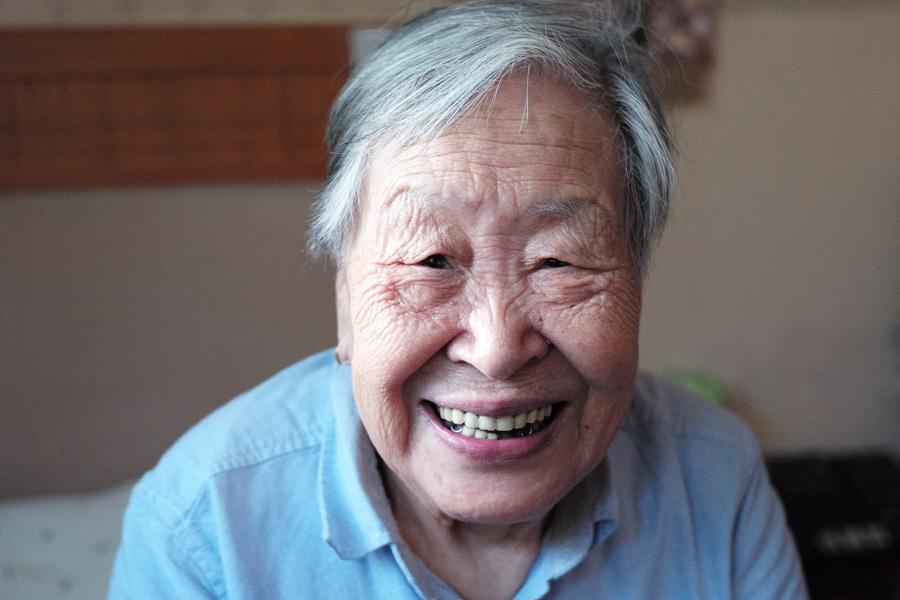 Person who is Elderly, smiling 
