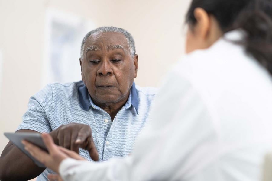 A patient discussing medical results with their doctor.