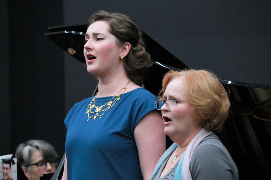 An alumna and faculty member performing together in 2019