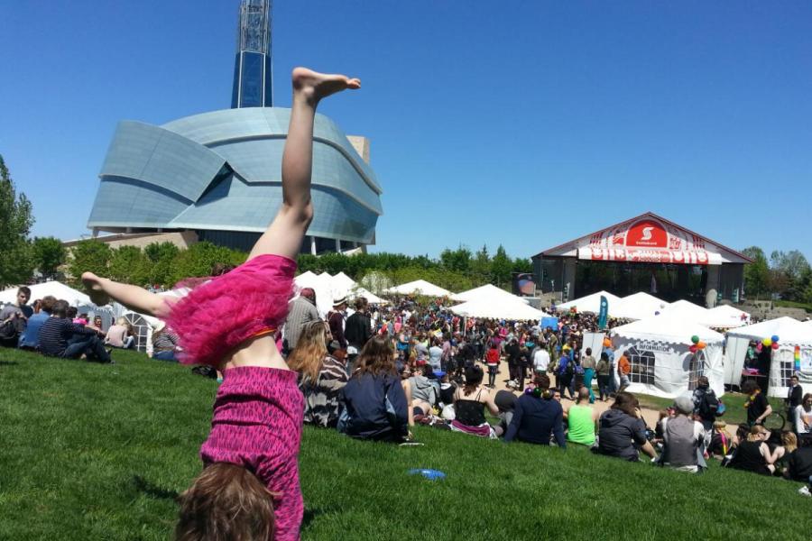 A crowd at a festival at the Scotia Bank Theatre beside the Human Rights Museum in Winnipeg.