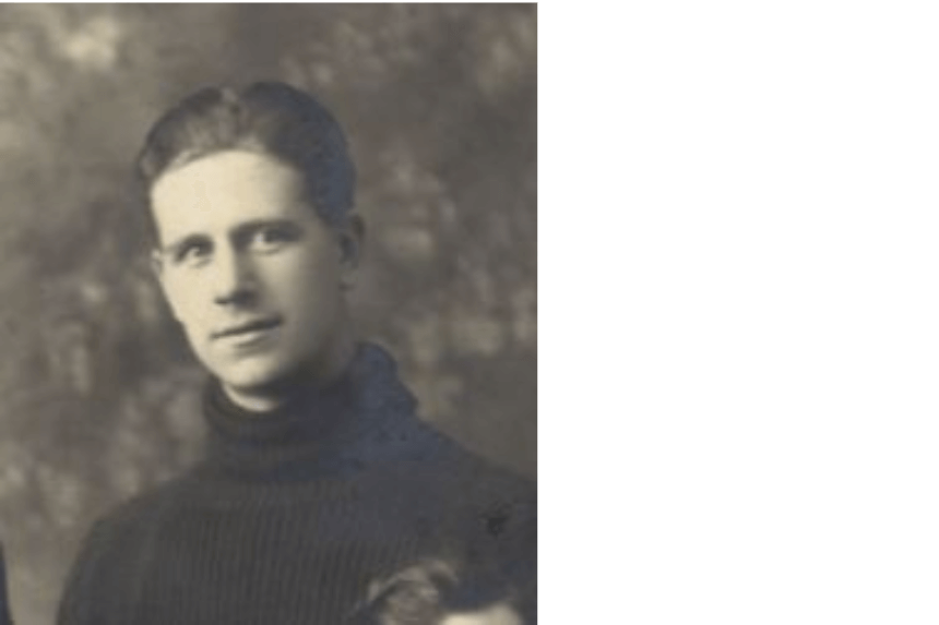 Robert Cunningham looking at the camera. The photo is in sepia color.