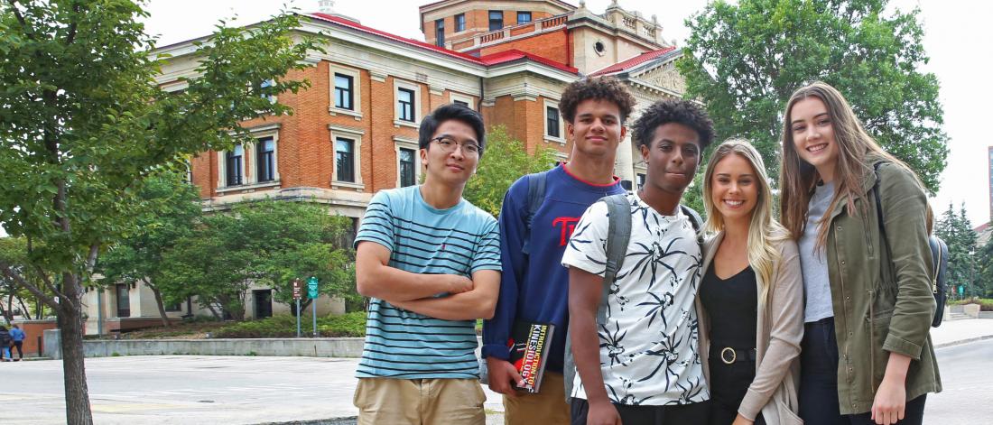 University of Manitoba students standing in front of the Administration building