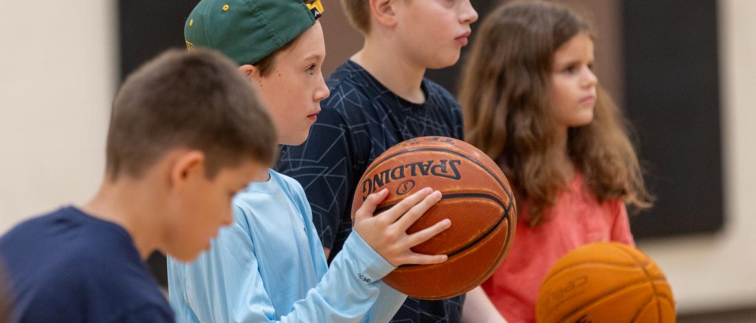 participants listening to basketball instructions