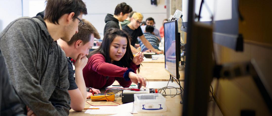 Students conduct group work in an Engineering lab.