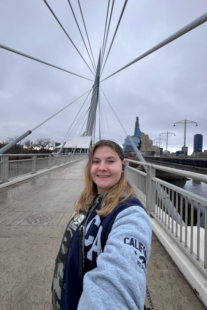 Exchange student Madi on the Esplanade Riel Footbridge, Winnipeg.