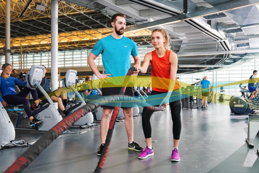 two people using the University of Manitoba Active Living Centre facility.