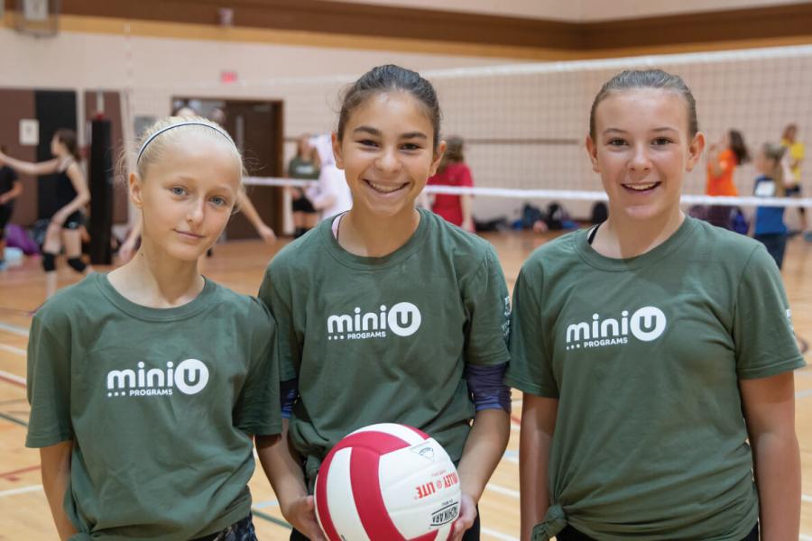 Three girls from the Mini U Senior Program during volleyball