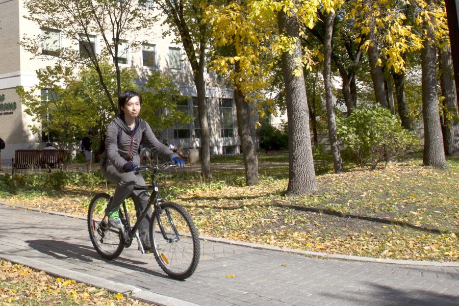 Student riding a bike