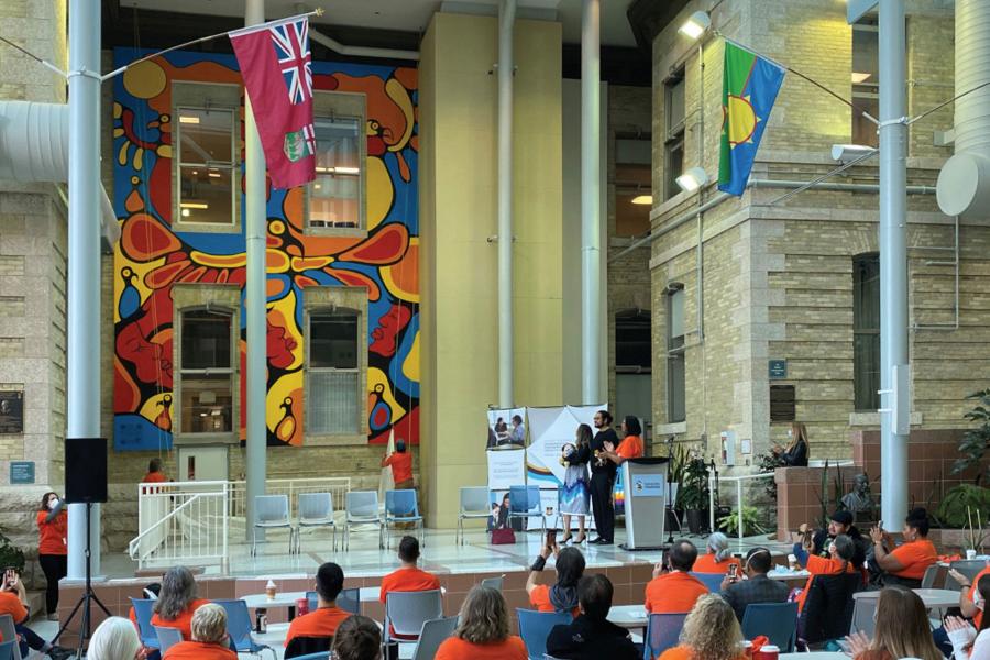 Anishinaabe artist Blake Angeconeb's mural on display in the Brodie Centre atrium. 