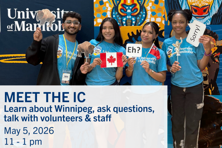 Students holding canada photo booth props