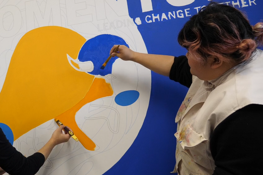School of Art student paints a mural to bring to life UM's new strategic plan.
