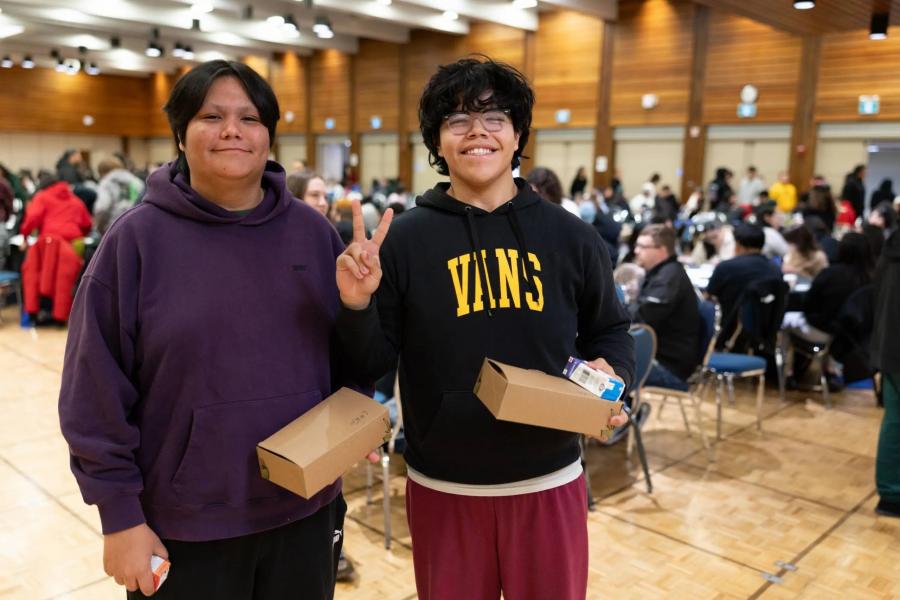 two students, smiling