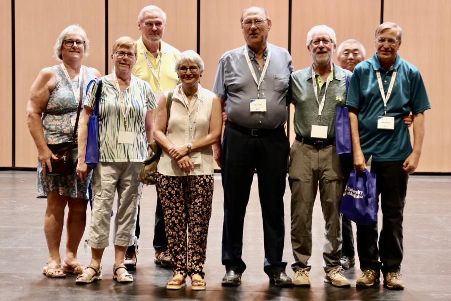 Faculty of Science Class of 1976 on stage at Desautels Concert Hall