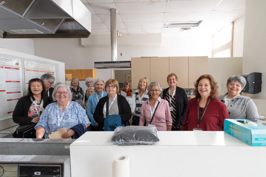 Human Ecology Class of 1976 classmates gathered in lab