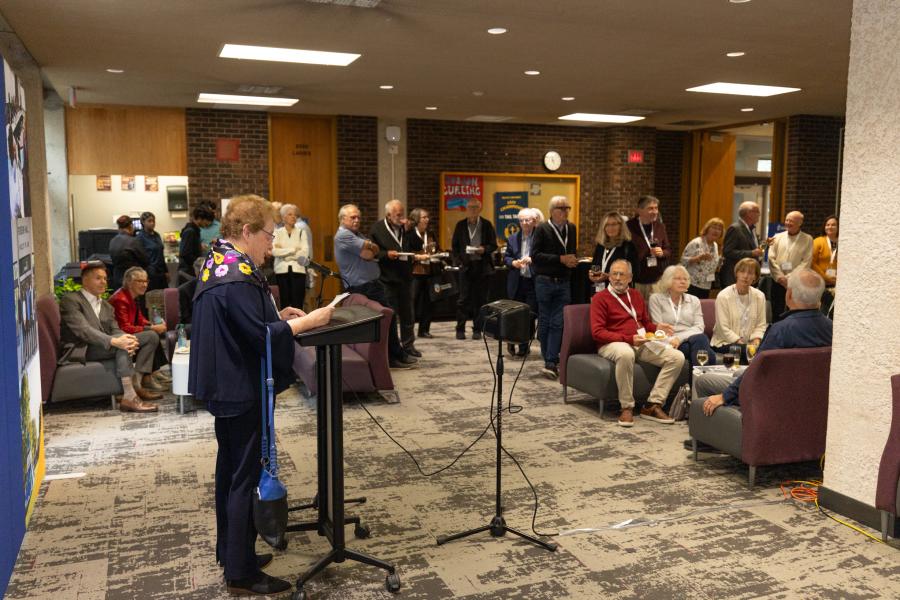 Carolyn Phillips, Reunion Class Leader, delivering remarks to the Class of 1976 during the reception in the Common Room of Robson Hall