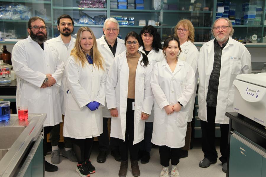group of researchers in lab