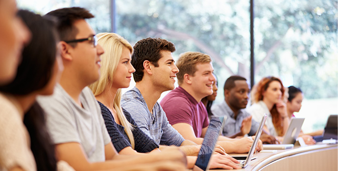 A diverse group of students in an orientation.