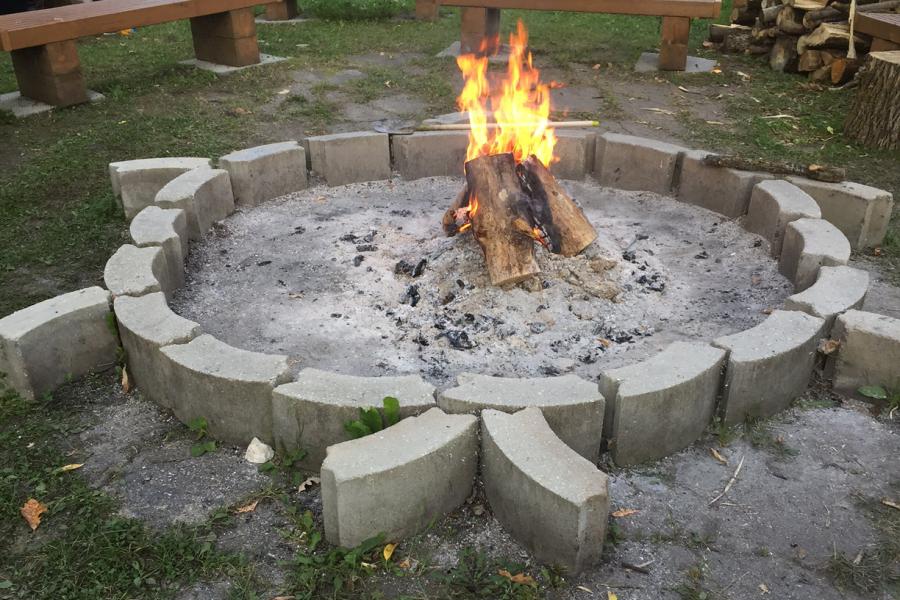 Burning fire pit at the MSWIK culture camp