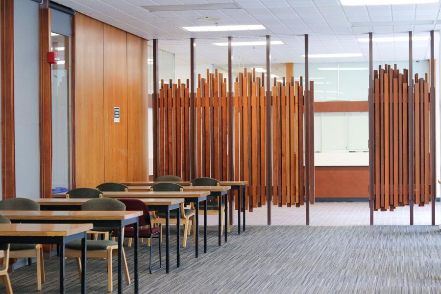 Empty tables and chairs in the University College Concourse lounge.